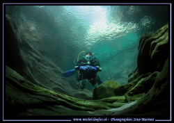 My wife Caroline - entering one of the pools - in the Val... by Michel Lonfat 